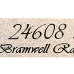 Textured Engraved Sign On Stone Granite