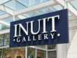 Angled close-up of white serif channel letters mounted on a deep navy backing plate.