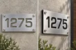 Cut-out brushed aluminum address sign 1275 with see-through and black backing options, front and side views